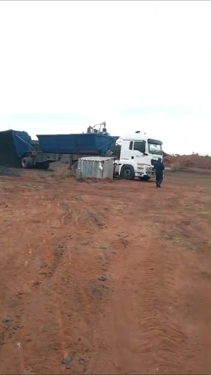 Chrome being tip-loaded into a road truck for transport